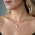 Luna single pearl necklace on a beuatiful young woman